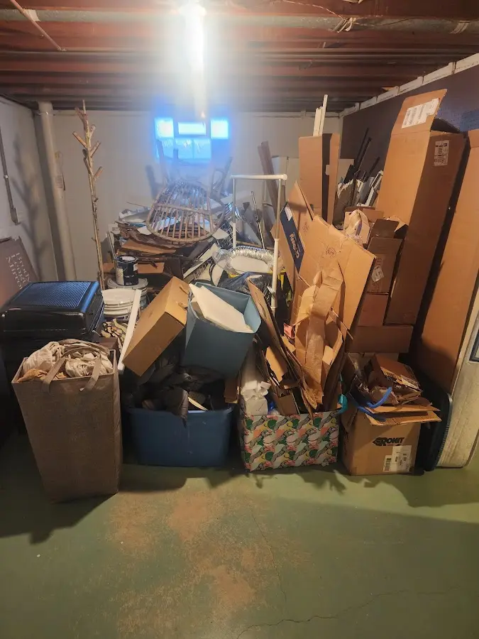 Roll-off dumpster container at job site for Construction Dumpster Rental in Cedar Falls